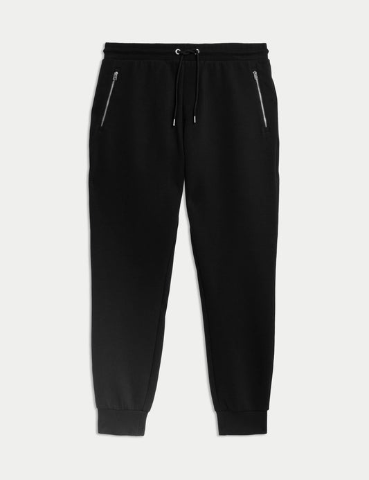 Jogger multideporte negro con bolsillos de cremallera